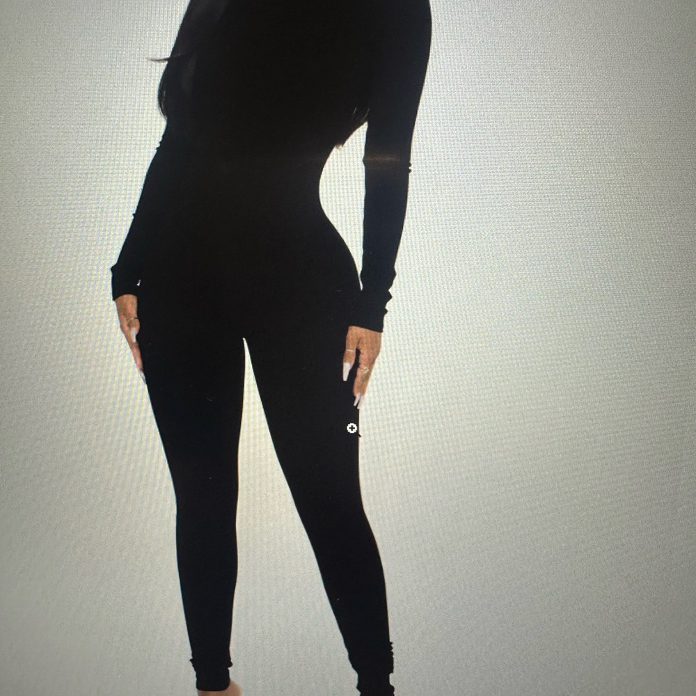 Fashion Nova Sleek Black Long Sleeve Jumpsuit